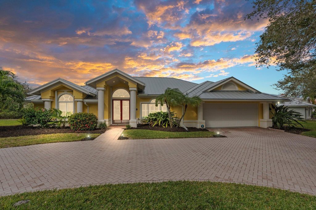 Photo of 1041 SW Lighthouse Drive, Palm City, FL 34990 (MLS # R10949716)