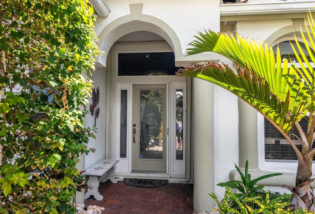 Photo of 1290 NW Red Oak Way, Jensen Beach, FL 34957 (MLS # R10948150)