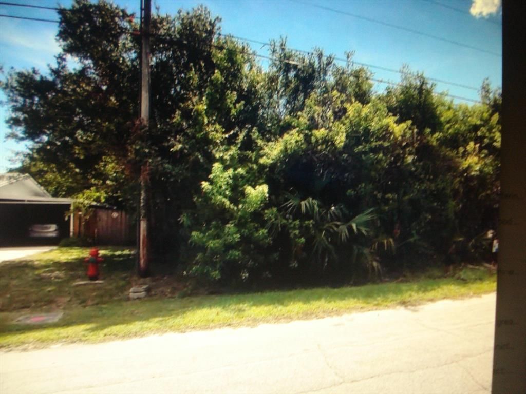 Photo of 5506 Myrtle Drive Dr, Fort Pierce, FL 34982 (MLS # R10829071)
