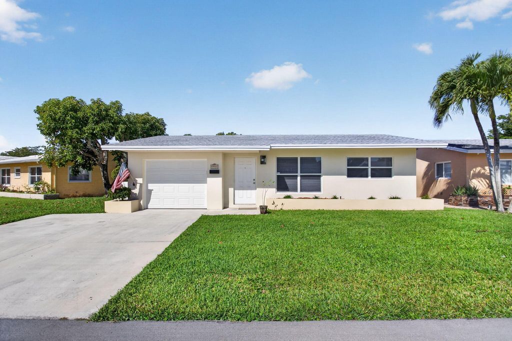 Photo of 5907 NW 71st Avenue, Tamarac, FL 33321 (MLS # B26028330)