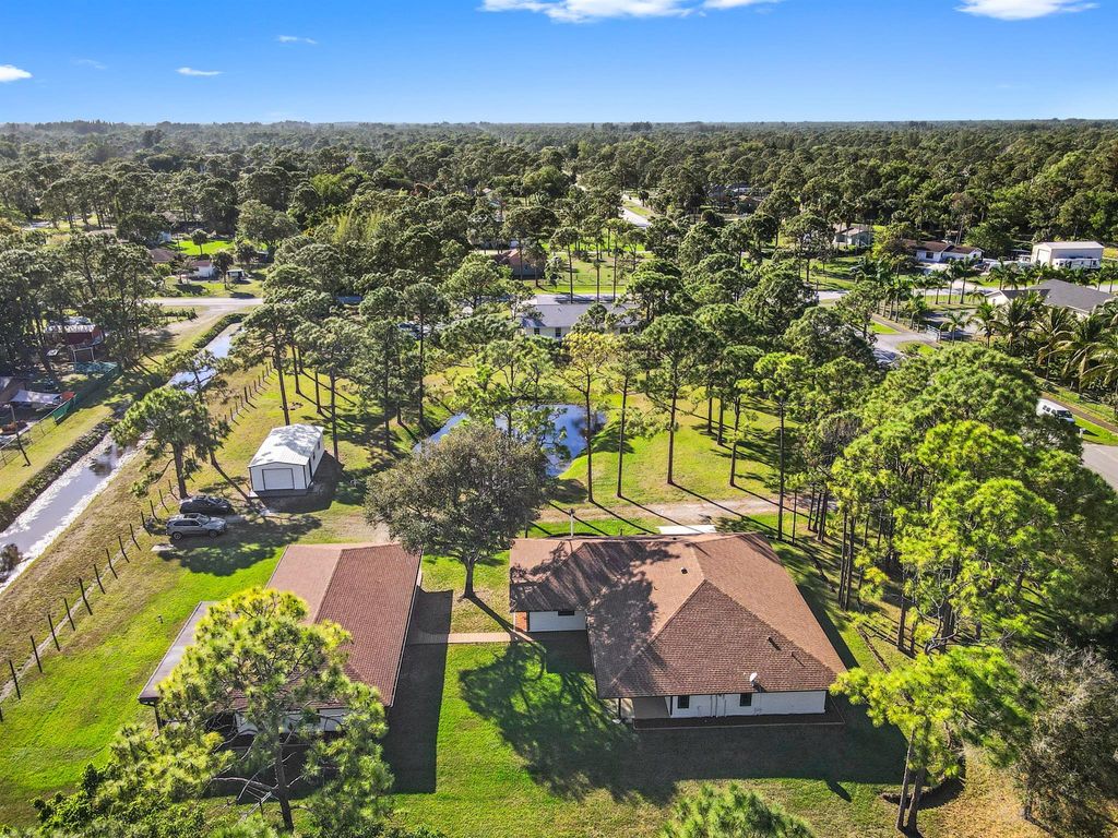 Photo of 11448 Tangerine Boulevard, West Palm Beach, FL 33412 (MLS # R10868540)