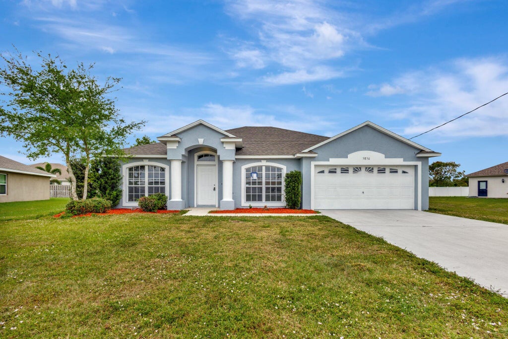 Photo of 5850 W Dooley Circle, Port Saint Lucie, FL 34986 (MLS # R11048325)