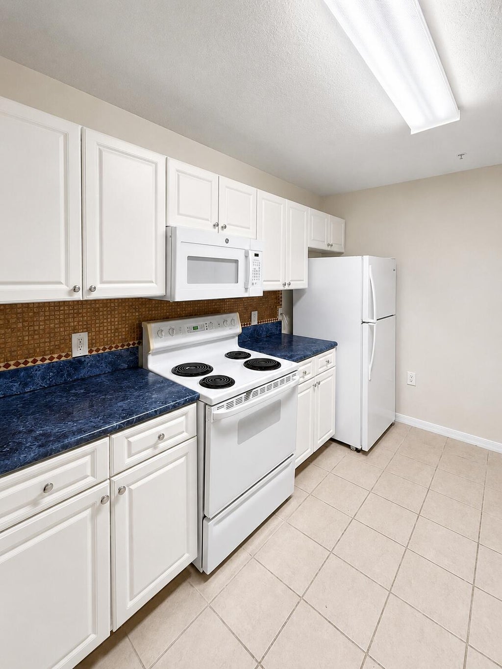 Photo of 1203 Town Center Drive #206, Jupiter, FL 33458 (MLS # B26074113)