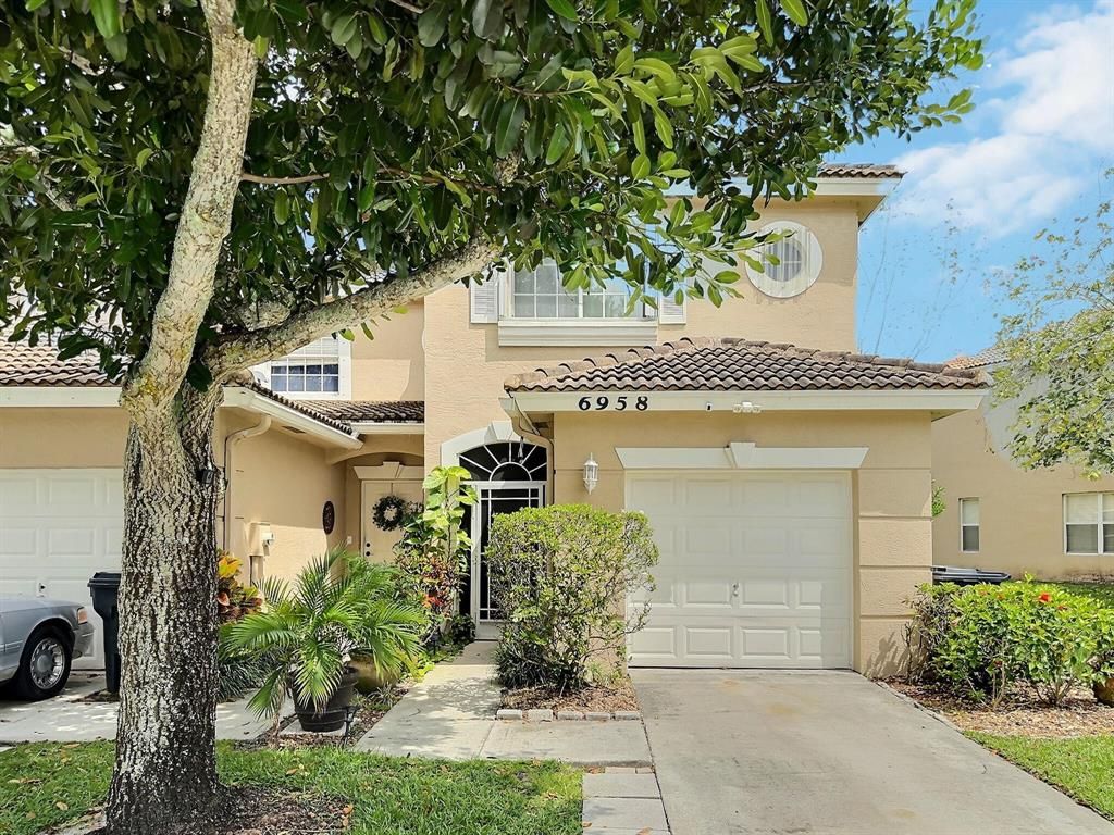 Photo of 6958 Oak Bridge Lane, Lake Worth, FL 33467 (MLS # R10885688)