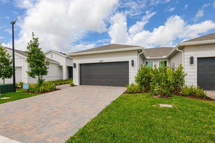 Photo of 10307 NW Dreamweaver Road, Port Saint Lucie, FL 34987 (MLS # B26051790)