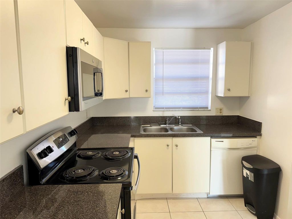 Photo of 9400 Live Oak Place #406, Davie, FL 33324 (MLS # F10551698)
