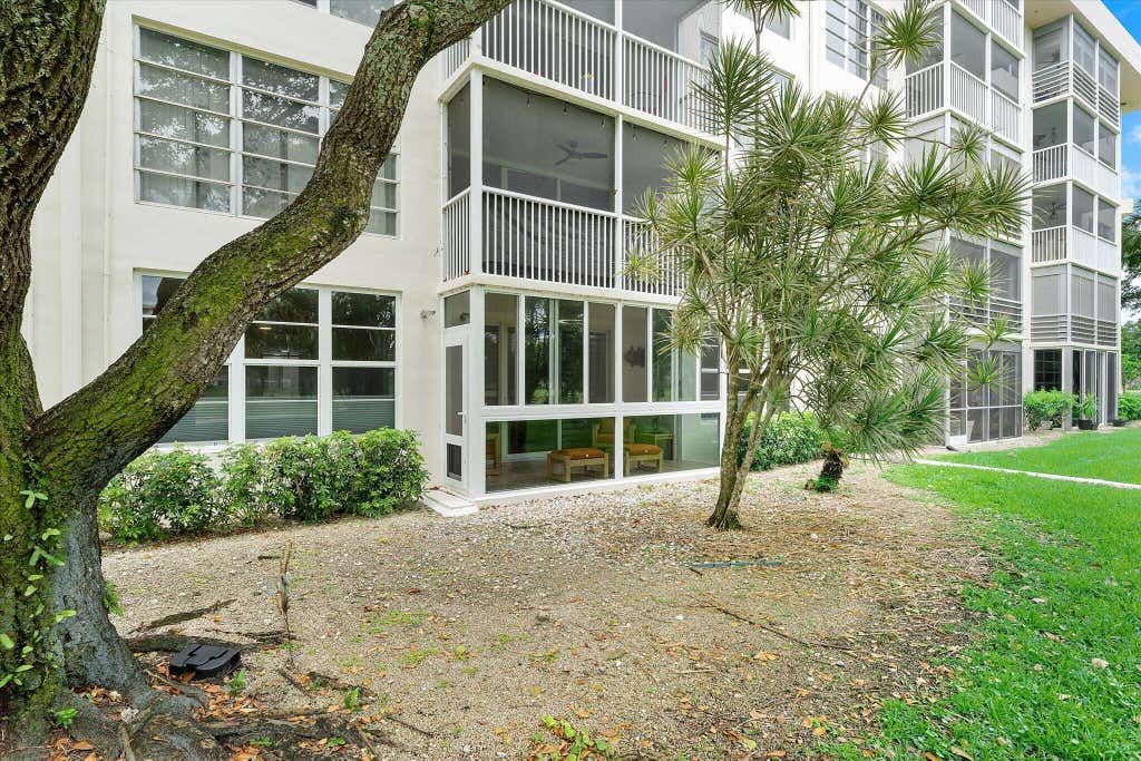 Photo of 3900 Oaks Clubhouse Drive #110, Pompano Beach, FL 33069 (MLS # B26038669)