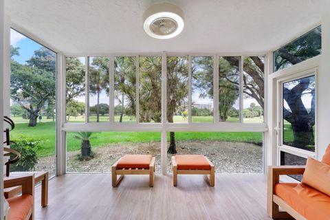 Photo of 3900 Oaks Clubhouse Drive #110, Pompano Beach, FL 33069 (MLS # B26038669)