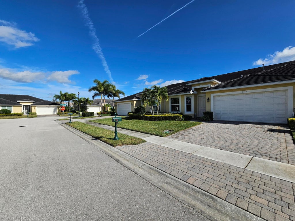 Photo of 6144 NW Argyll Lane, Port Saint Lucie, FL 34983 (MLS # R10946000)