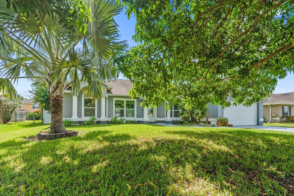 Photo of 1901 SW Diamond Street, Port Saint Lucie, FL 34953 (MLS # R11115724)