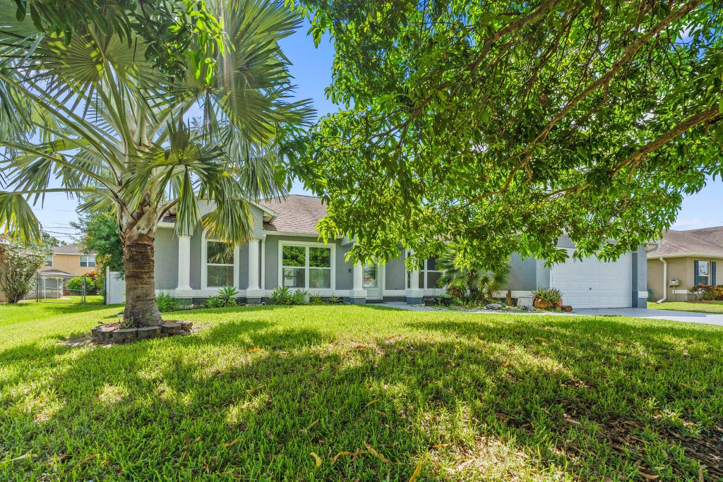 Photo of 1901 SW Diamond Street, Port Saint Lucie, FL 34953 (MLS # R11115724)