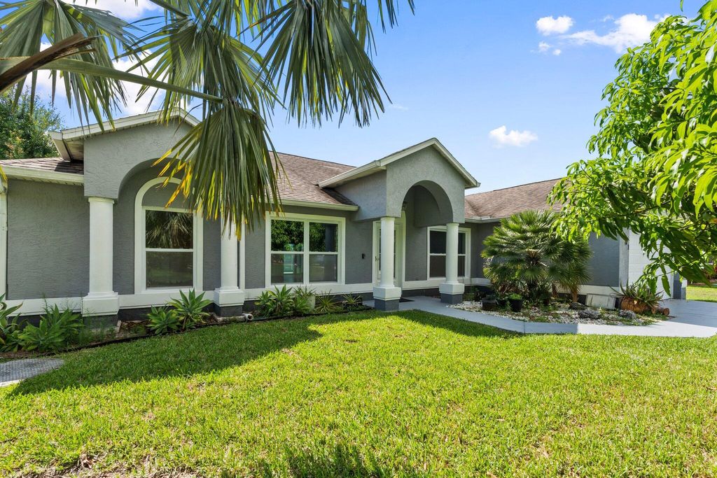 Photo of 1901 SW Diamond Street, Port Saint Lucie, FL 34953 (MLS # R11115724)