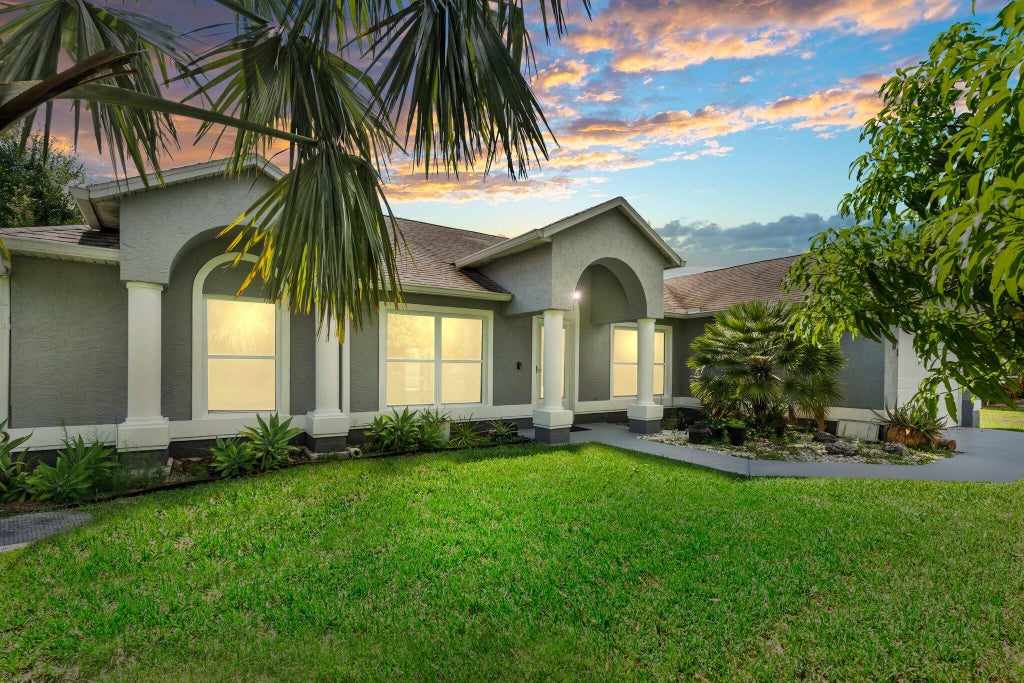 Photo of 1901 SW Diamond Street, Port Saint Lucie, FL 34953 (MLS # R11115724)