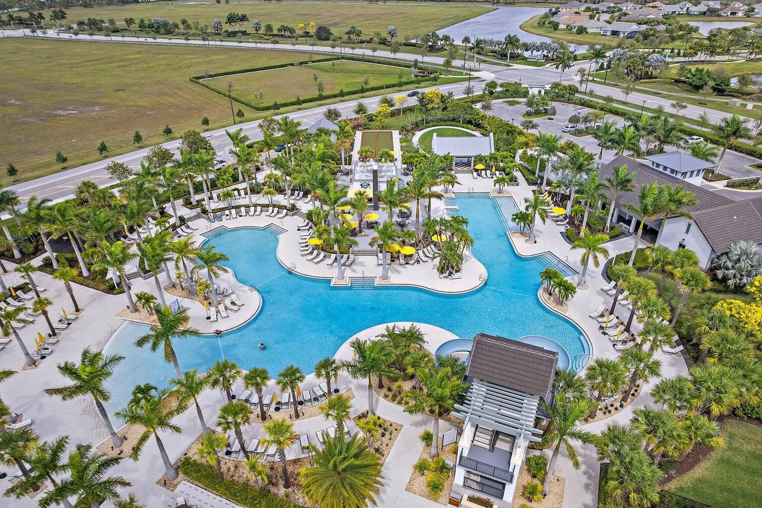 Welcome to Palm Beach County's newest city of Westlake (WPB). Seller has been transferred, and you won't want to miss this opportunity! Don't settle for smaller, less-upgraded new construction when you can own a luxury townhome, fully built, beautifully upgraded, and ready now. The largest model available at 2,138 sq. ft. offers more space, higher-end finishes, and a more functional layout than the builder's new releases. Add the private, fenced backyard overlooking lush, mature landscaping, and it feels like a single-family home! There are no more units like this being built in the community. Energy-efficient features include impact windows, a natural gas tankless hot water heater, a variable-speed HVAC, an Ecobee smart thermostat, tile roof and a 2-car garage with an epoxy floor.