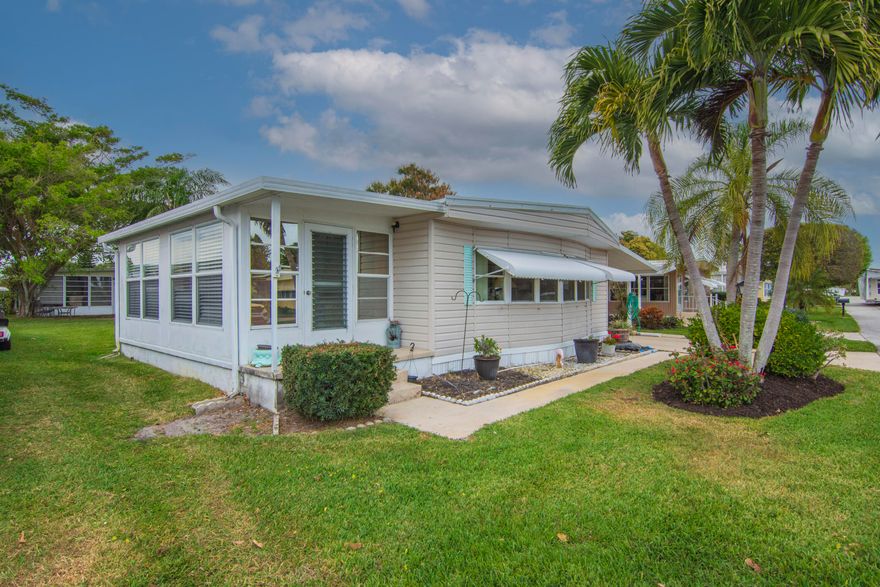 Welcome to 293 Moonstone Drive, Jensen Beach, Fl. This charming double-wide home is nestled in the sought after 55+ community of Pinelake Village, just minutes from the ocean. This well maintained 2-bedroom, 2 bath-home comes partially furnished and is just a short stroll to the clubhouse and pool. You will love the Florida Room where you can relax, enjoy your favorite beverage, or just socialize with friends and family. Newer AC installed in 2022, Water Heater 2017, and Roof 2015. Lot rent is $805.00 per month and includes cable, trash removal, recycling and all clubhouse amenities. HOA Membership is voluntary and costs only $10.00 per year, per household.