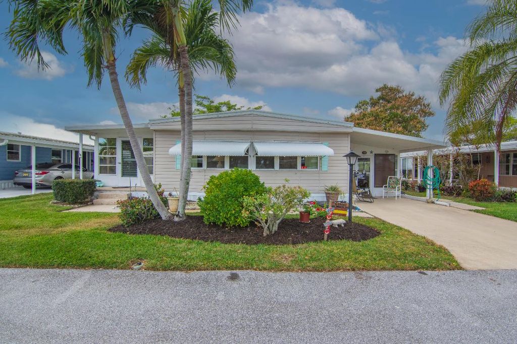 Photo of 293 NE Moonstone Drive, Jensen Beach, FL 34957 (MLS # R11105720)