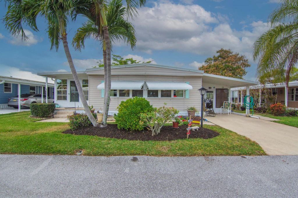 Photo of 293 NE Moonstone Drive, Jensen Beach, FL 34957 (MLS # R11105720)