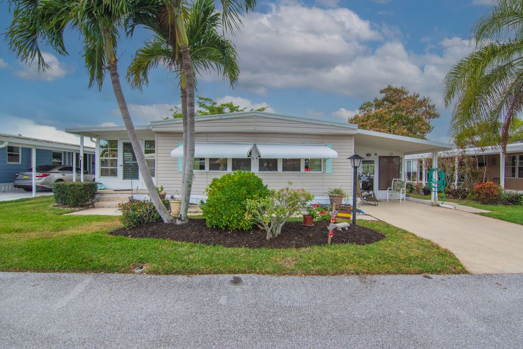 Photo of 293 NE Moonstone Drive, Jensen Beach, FL 34957 (MLS # R11105720)