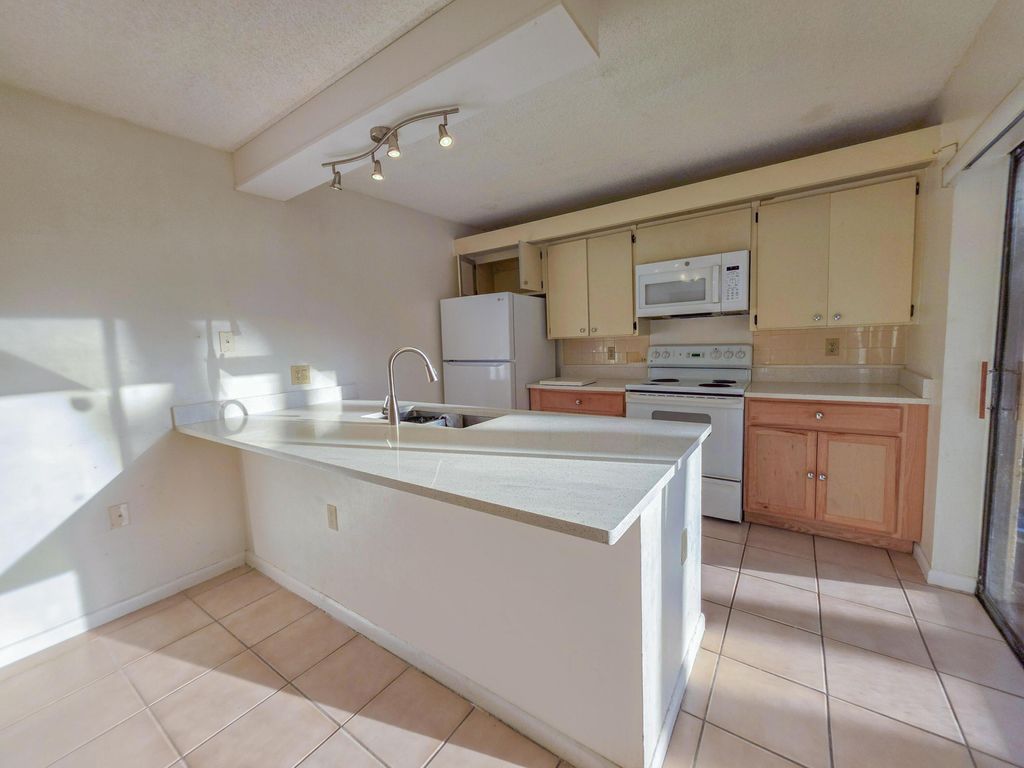 Photo of 832 Blue Ridge Circle, West Palm Beach, FL 33409 (MLS # B26012065)