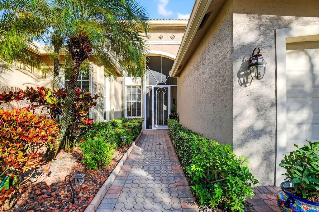 Photo of 7615 Tarpon Cove Circle, Lake Worth, FL 33467 (MLS # F10548788)