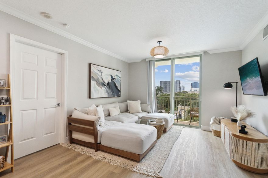 Available between May an October in one of the best buildings in Downtown West Palm Beach! This beautifully renovated condo features a a cozy sitting area and a private balcony overlooking the pool. The kitchen is fully equipped with modern appliances. The primary bedroom has a large bathroom and closet. The second bedroom, featuring a Murphy bed, is perfect for use as an office during the day and also has a bathroom and closet. Tenants can enjoy building amenities such as an infinity pool, BBQ areas, Jacuzzi, sauna, steam bath, fitness center, and 24h front desk. The unit comes with one parking space, with additional spaces available for rent. Just steps away from the best restaurants, bars, shops, CityPlace, the Intracoastal, and ocean.