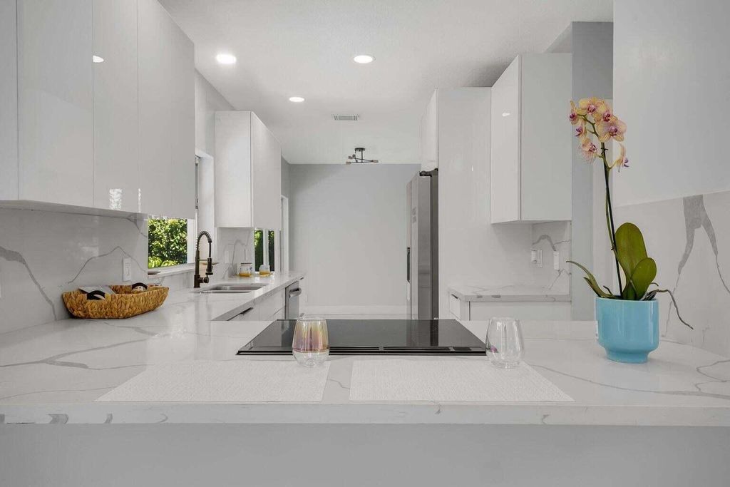Photo of 3740 Wilderness Way, Coral Springs, FL 33065 (MLS # B26030482)