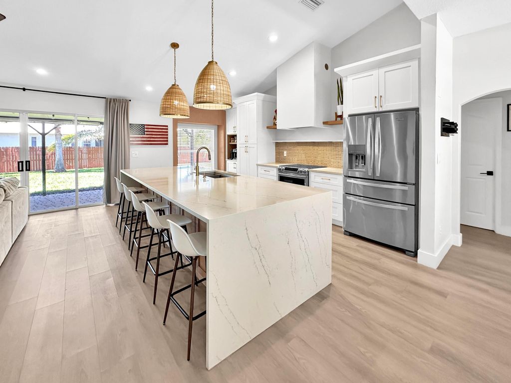 Photo of 1726 SW Erie Street, Port Saint Lucie, FL 34953 (MLS # R11089385)