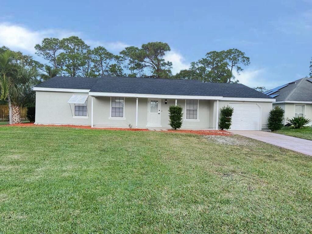 Photo of 319 SE Faith Terrace, Port Saint Lucie, FL 34953 (MLS # R10946673)