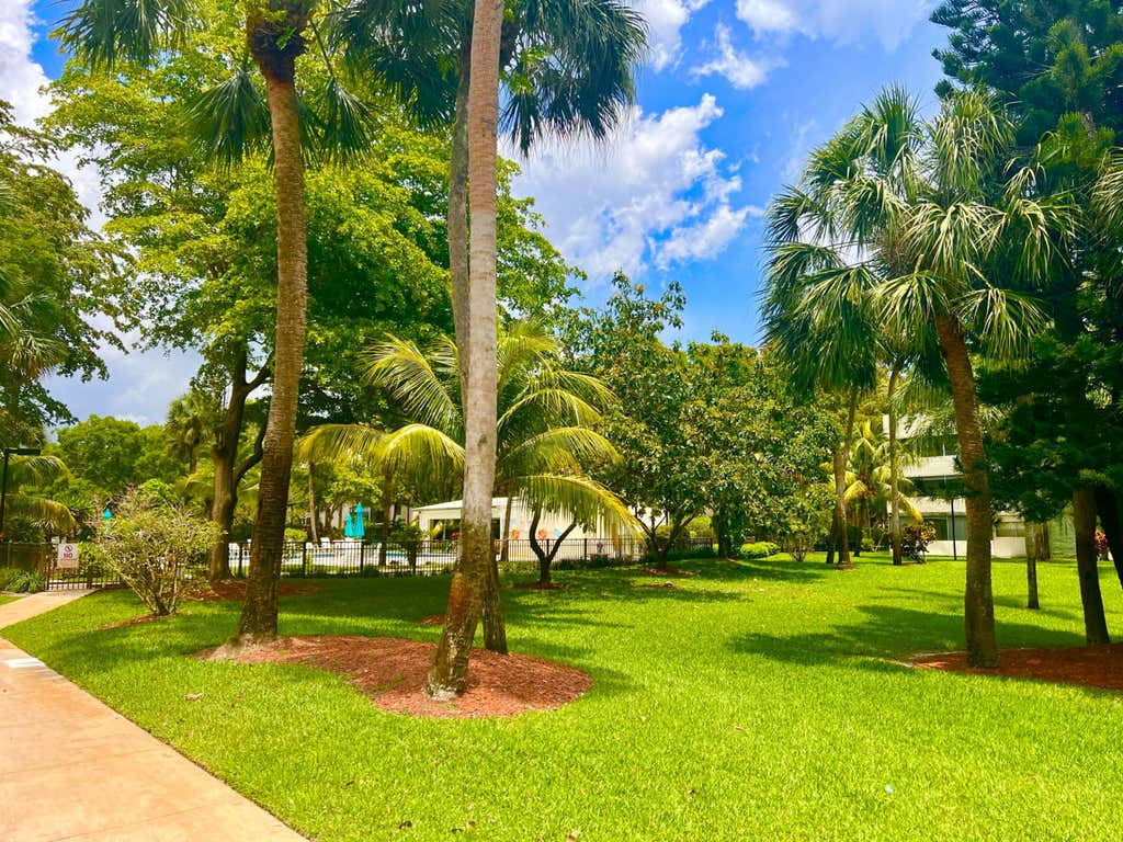 Photo of 5155 E Sabal Palm Boulevard #209, Tamarac, FL 33319 (MLS # B26063494)