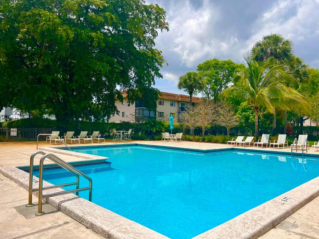Photo of 5155 E Sabal Palm Boulevard #209, Tamarac, FL 33319 (MLS # B26063494)