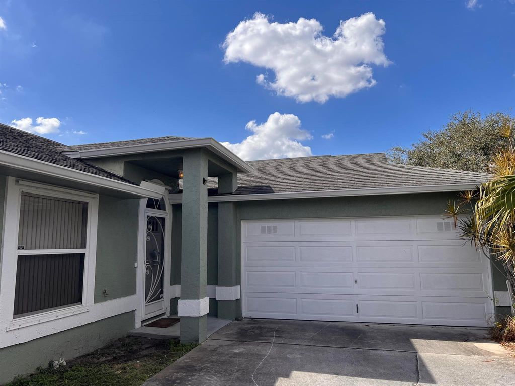 Photo of 1106 SW Gardena Avenue, Port Saint Lucie, FL 34953 (MLS # R11061088)