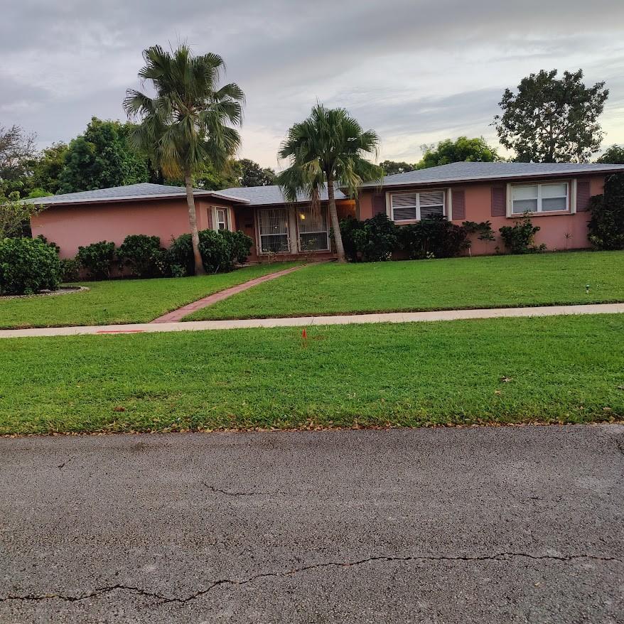 Spacious corner lot home, featuring tile flooring throughout most of the house. Recent upgrades include a roof, A/C, and water system all under 4 years old. The kitchen is designed for both style and function with granite countertops, stainless steel appliances, and a pass-through window to the patio, ideal for entertaining. Enjoy an expansive patio and large backyard with room for a pool and a variety of fruit trees that add natural charm. For peace of mind, the home features accordion shutters on the front and side windows, with the back window and three sliding glass doors upgraded to impact glass.
Financing Bonus: Assumable FHA mortgage at 3.96% available—huge savings in today's market! Plus, qualified buyers may receive a FREE 1% rate buydown when using the seller’s approved broker