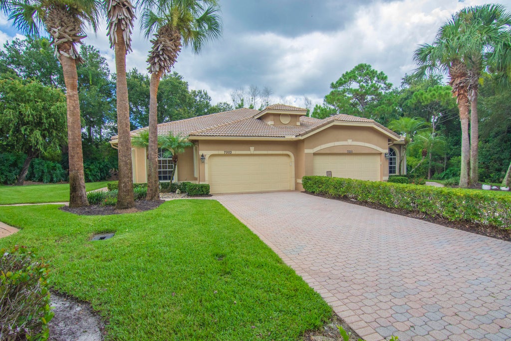 Photo of 7003 Willow Pine Way, Port Saint Lucie, FL 34986 (MLS # B26066039)