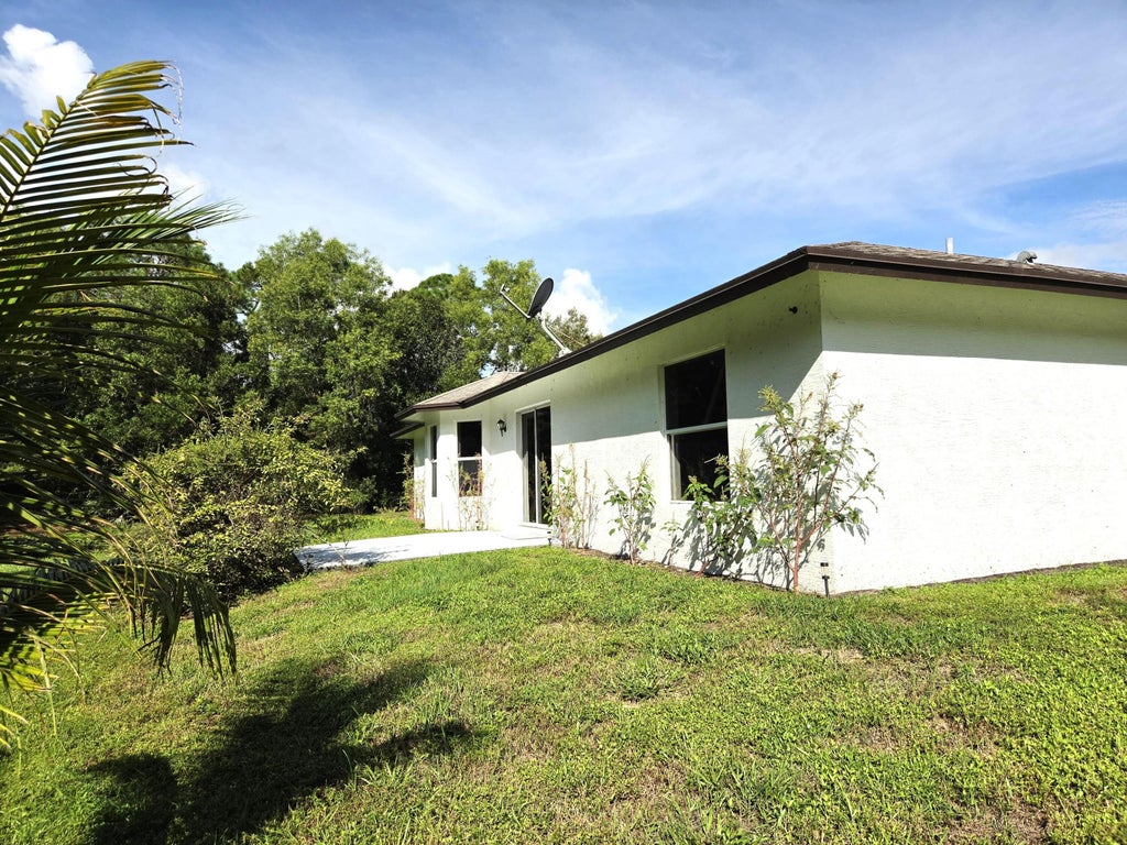 Photo of 17148 30th Lane N, Loxahatchee, FL 33470 (MLS # B26086521)