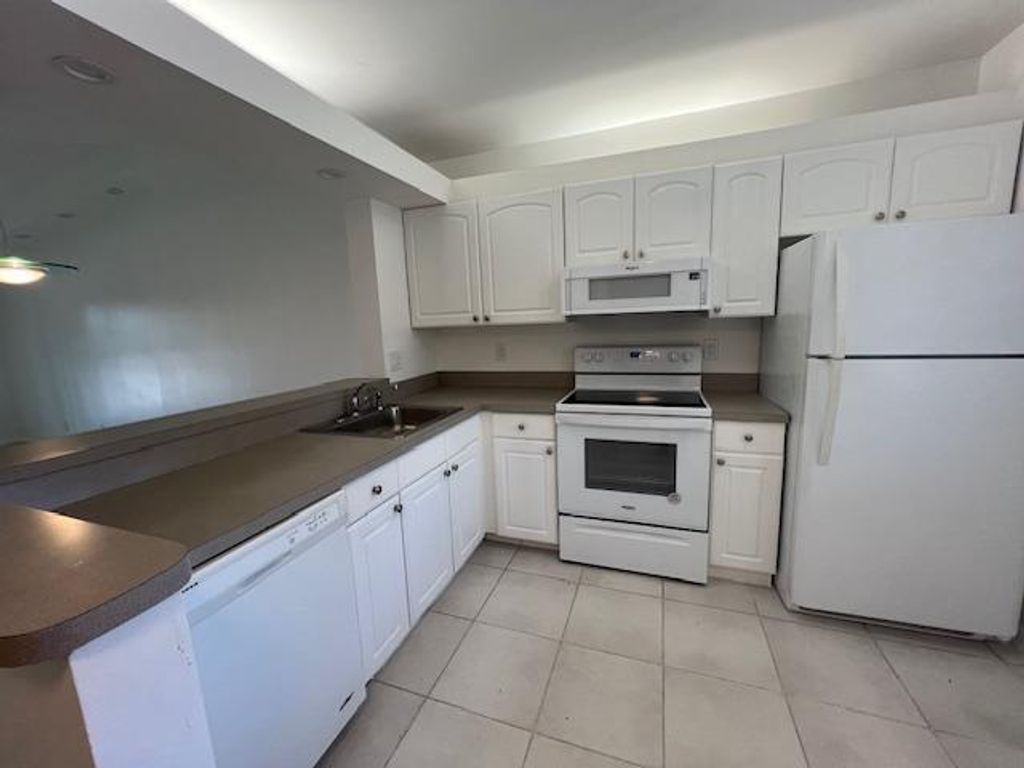 Photo of 6585 Somerset Drive #201, Boca Raton, FL 33433 (MLS # R10991711)