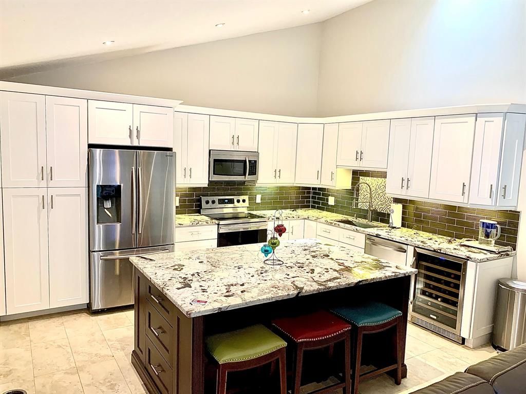 Photo of 5959 Golden Eagle Circle Cir, Palm Beach Gardens, FL 33418 (MLS # R10825546)