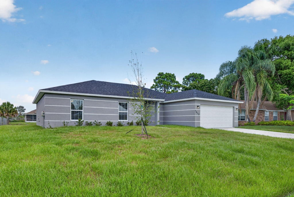 Photo of 1517 SW Aledo Lane, Port Saint Lucie, FL 34953 (MLS # R11110543)