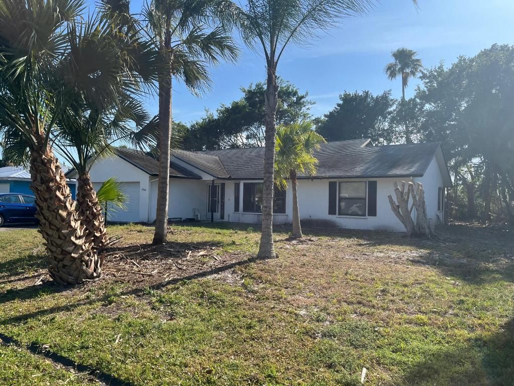 Photo of 2250 SE Shelter Drive, Port Saint Lucie, FL 34952 (MLS # R10936775)