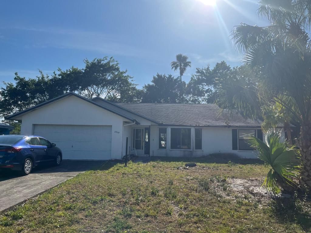 Photo of 2250 SE Shelter Drive, Port Saint Lucie, FL 34952 (MLS # R10936775)