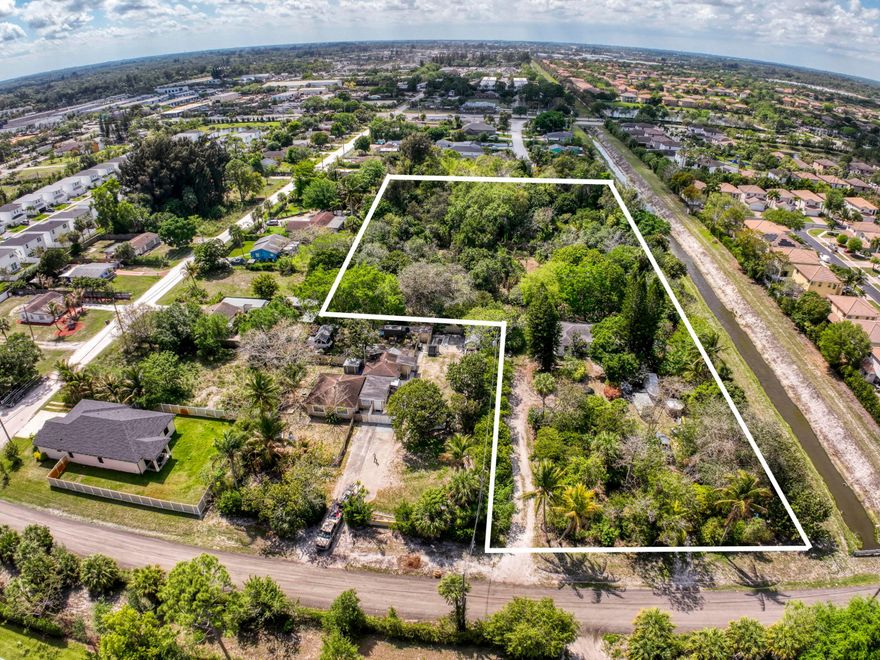 Great opportunity to purchase two parcels being sold together: 00424327050050610 and 00424327050050611. Offering just over 4 acres combined, this property is located in a highly desirable area of West Palm Beach and presents an excellent opportunity for investors, builders, or developers. Ideal for future development or land banking. Don't miss this unique offering with strong potential.