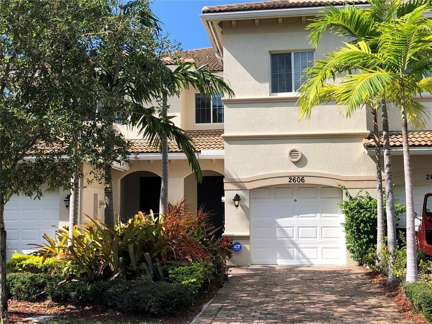 Beautiful townhouse 3 BR 2.5 BA,  2 miles to downtown Delray Beach!! Built in 2014, 2 story home with upgraded kitchen cabinets, stainless steel appliances, wood flooring throughout the first floor and a covered patio. Three spacious bedrooms upstairs. Pet-friendly complex (large dogs welcome). A great place to call home!,   Low HOA fee. Located on a quiet street but only about 2 miles from Atlantic Ave in downtown Delray Beach with fabulous shopping and delicious restaurants.