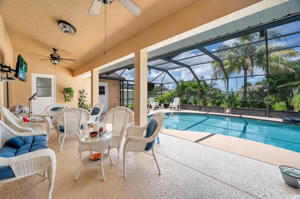 Photo of 333 SW Whitmore Drive, Port Saint Lucie, FL 34984 (MLS # R11008402)