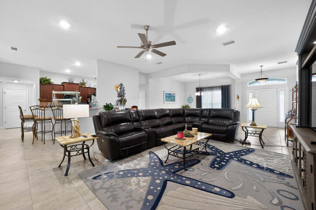 Photo of 1858 SW Mackenzie Street, Port Saint Lucie, FL 34953 (MLS # B26032312)