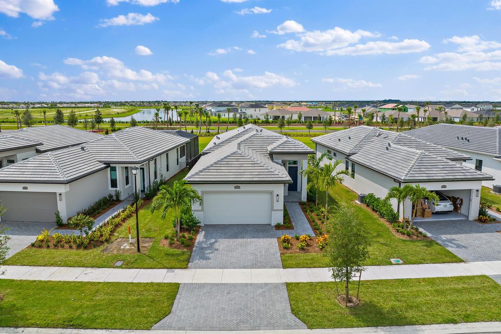 Photo of 9345 SW Pepoli Way, Port Saint Lucie, FL 34987 (MLS # R11064318)