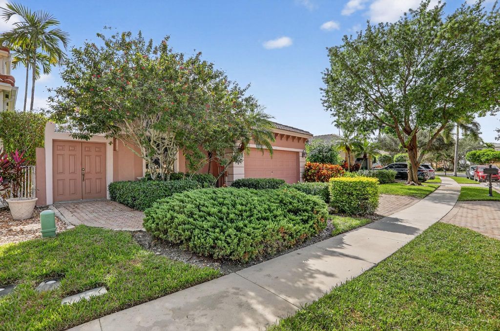 Photo of 5859 NW 125th Ter, Coral Springs, FL 33076 (MLS # F10532585)