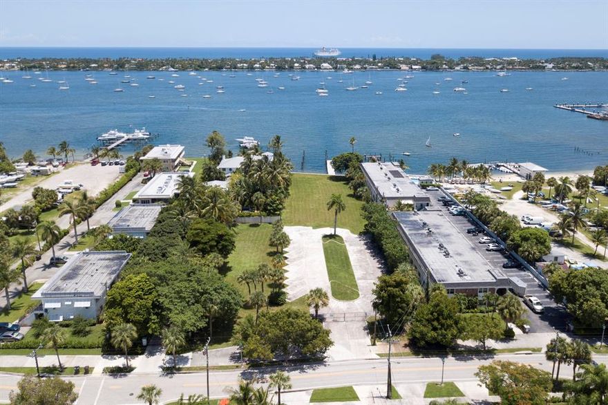 One of the best Opportunity Zone properties in the US in the heart of Palm Beach County!  Currently approved for 28 large 3 bedroom and 3.5 bath condos w/ 7 boat docks. The 7 Penthouse's have rooftop terraces with spectacular Intracoastal water views. The property is 1.23 acres and has 100' of waterfront.  It could also be subdivided into two waterfront buildable single family lots.  The deep water dock can accommodate a very large vessel. The property has over 230' of submerged land ownership making this one of the best waterfront parcels available in all of SE Florida. No fixed bridges to the Ocean Inlet at the north end of Palm Beach and just a few hundred feet from one of the largest yacht marinas in the world which is approved for over 1000 units and a state of the art Marina Village!
