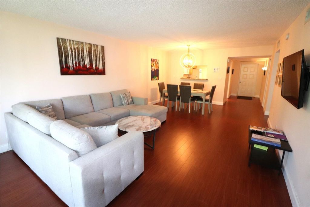 Photo of 3850 Oaks Clubhouse Drive #506, Pompano Beach, FL 33069 (MLS # F10410017)