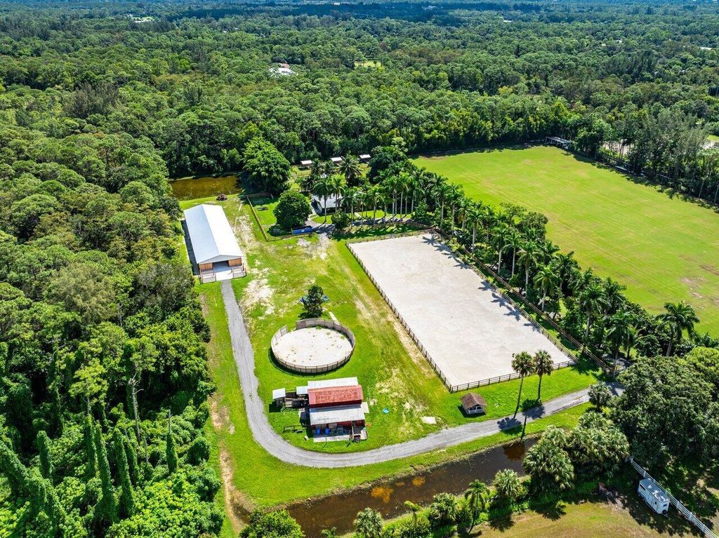 Photo of 1068 D Road, Loxahatchee Groves, FL 33470 (MLS # R11135091)