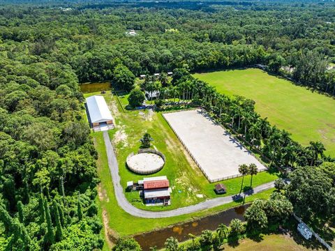 Photo of 1068 D Road, Loxahatchee Groves, FL 33470 (MLS # R11135091) Photo of 1068 D Road, Loxahatchee Groves, FL 33470 (MLS # R11135091)