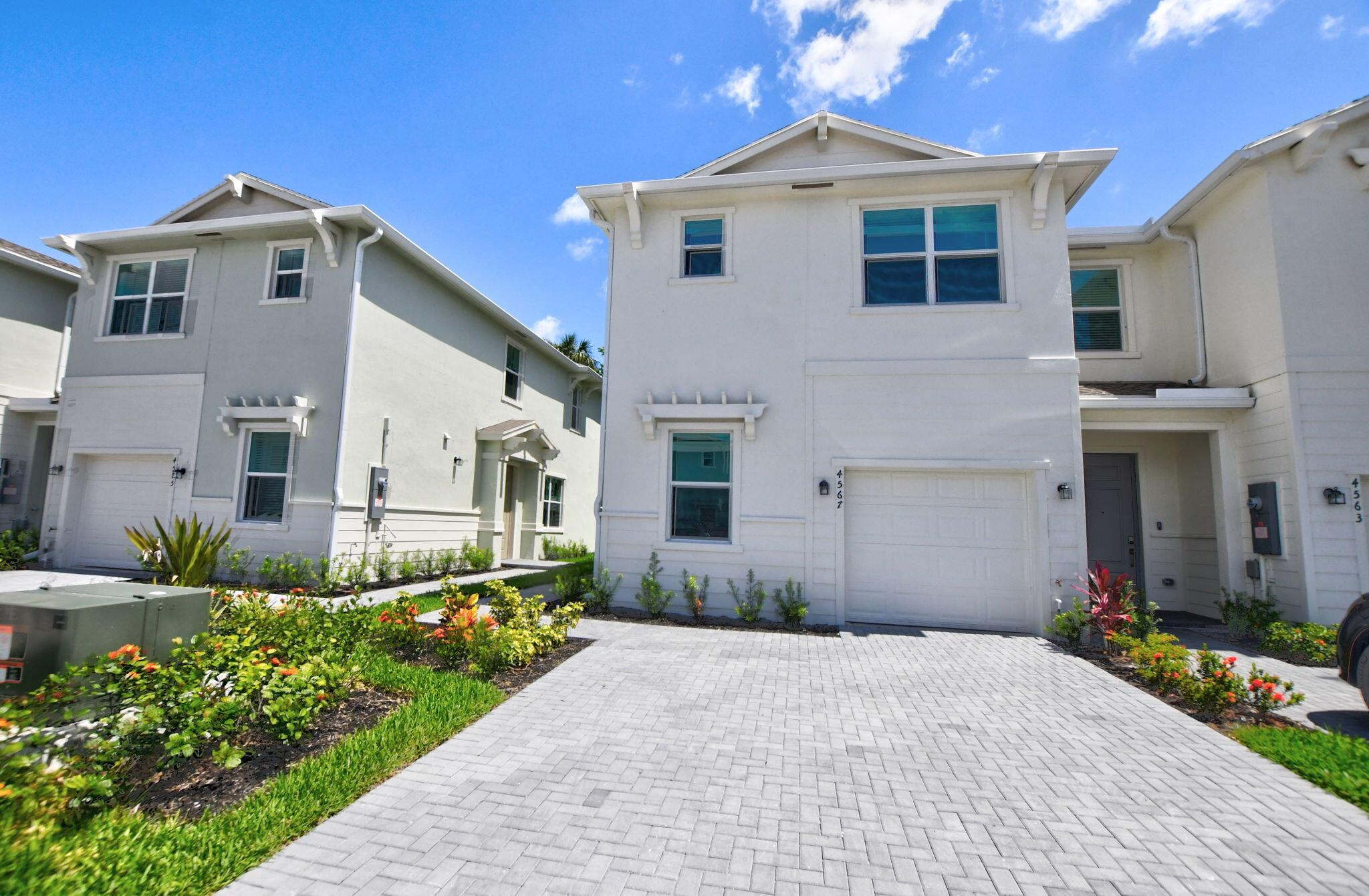 Attn FHA buyers, nestled in the prestigious Palm Beach County, this 2-story townhouse spans 1635 square feet, offering a blend of luxury and practicality. It boasts three bedrooms and two full and one-half bathrooms, catering to both privacy and convenience. The home office is a sanctuary for productivity. An attached terrace provides a serene retreat for breaks or casual evenings. An open-concept dining room creates an inviting atmosphere for entertaining, seamlessly integrating with the living spaces. The residence is equipped with impact glass, ensuring peace of mind. Residents can enjoy the community pool and cabana, a social hub for relaxation and leisure. This townhouse is not just a dwelling but a lifestyle choice for those seeking comfort and class in a highly sought-after locatio